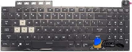 Black laptop keyboard laid flat with most keys intact and a pink indicator button in the top-right corner.