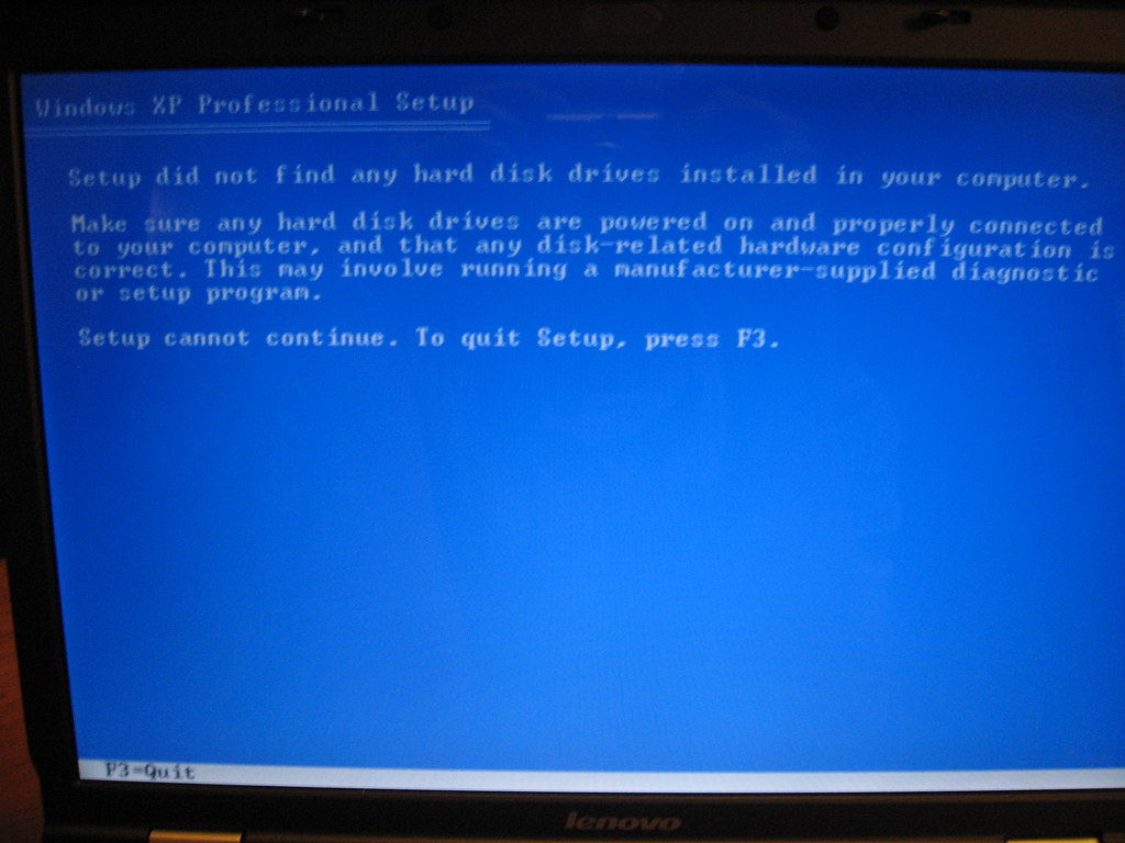 Blue Windows XP Professional Setup screen showing: no hard disk drives detected; setup cannot continue, press F3 to quit.