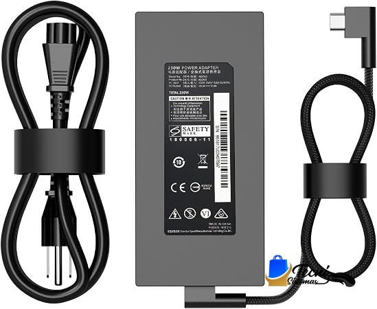 Gray power adapter with attached mains plug cord on the left and a braided output cable on the right, label visible on the center unit.